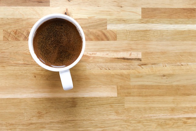 golden Maris Piper potatoes with smooth skin arranged on rustic wooden board